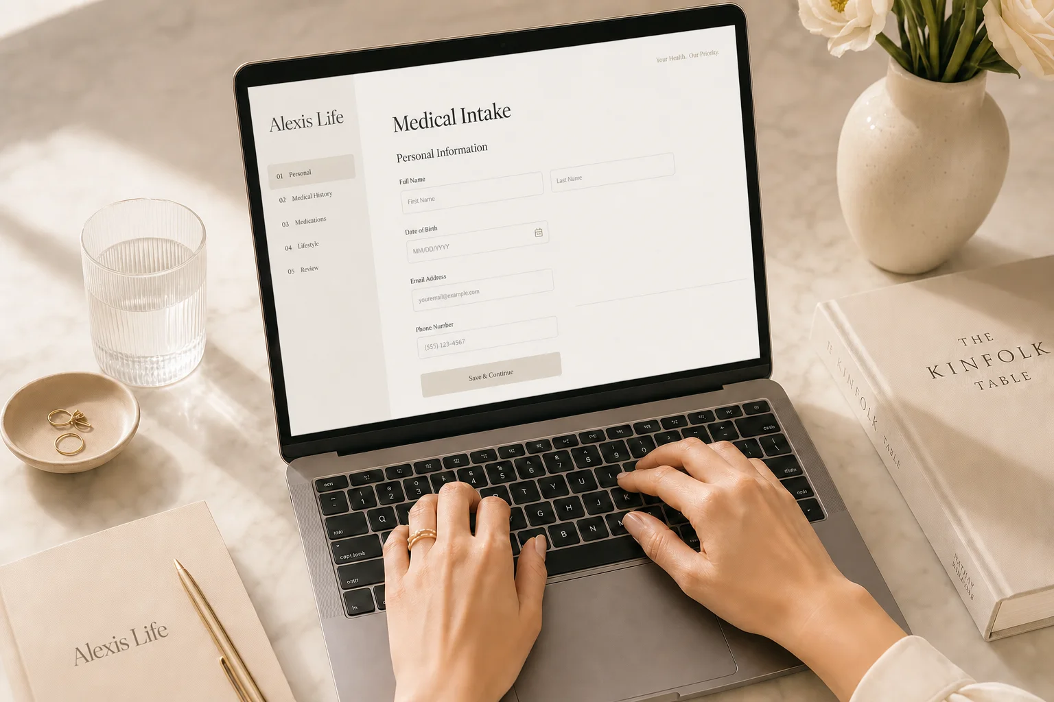 Patient completing confidential medical intake on laptop